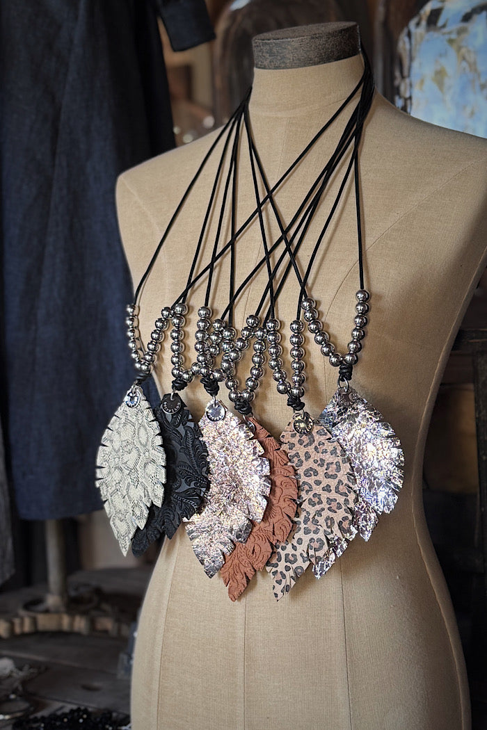 MICKELLOO TAKING FLIGHT NECKLACE - SNAKE