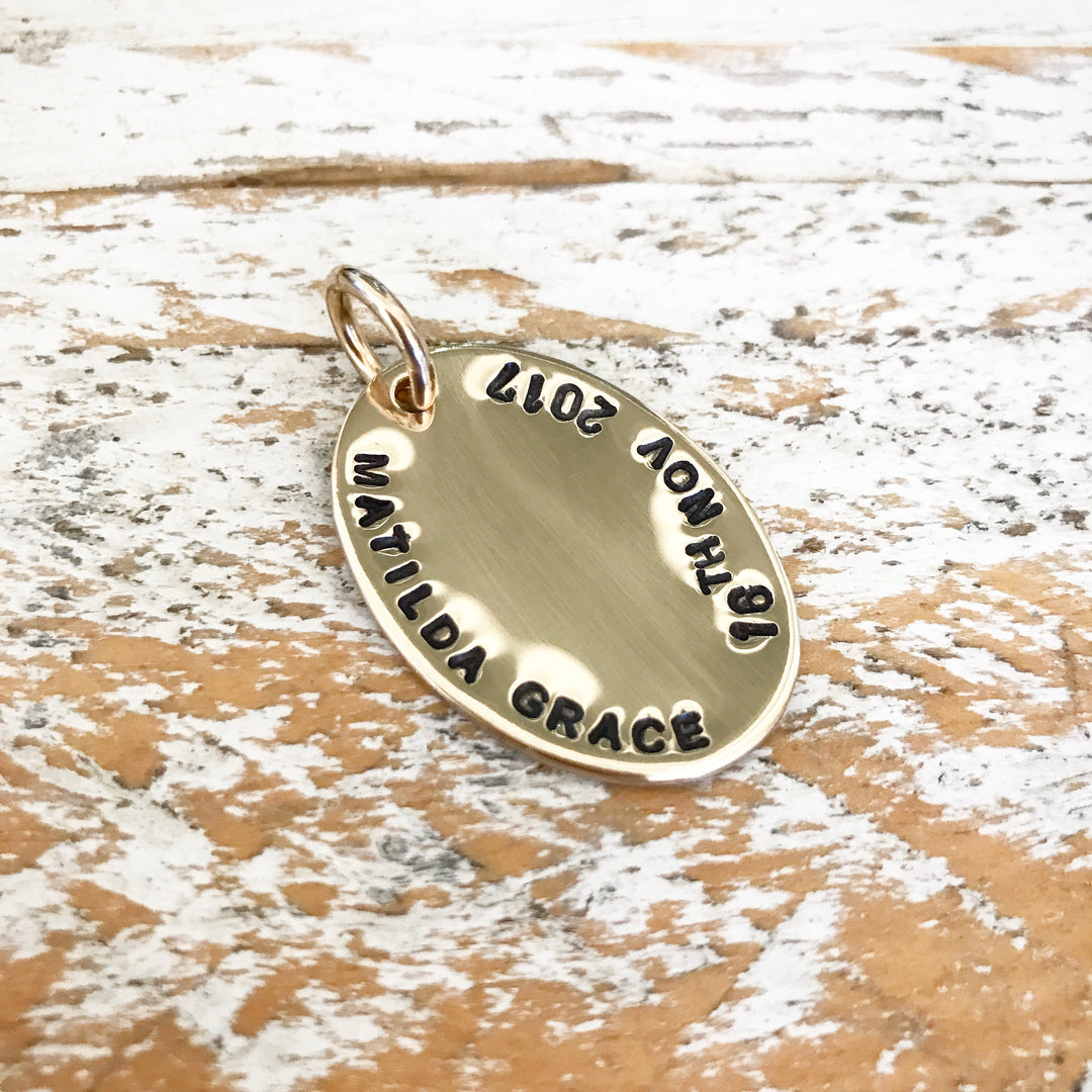 HAND STAMPED GOLD OVAL PENDANT