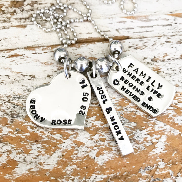 HAND STAMPED SILVER LOVE PENDANT