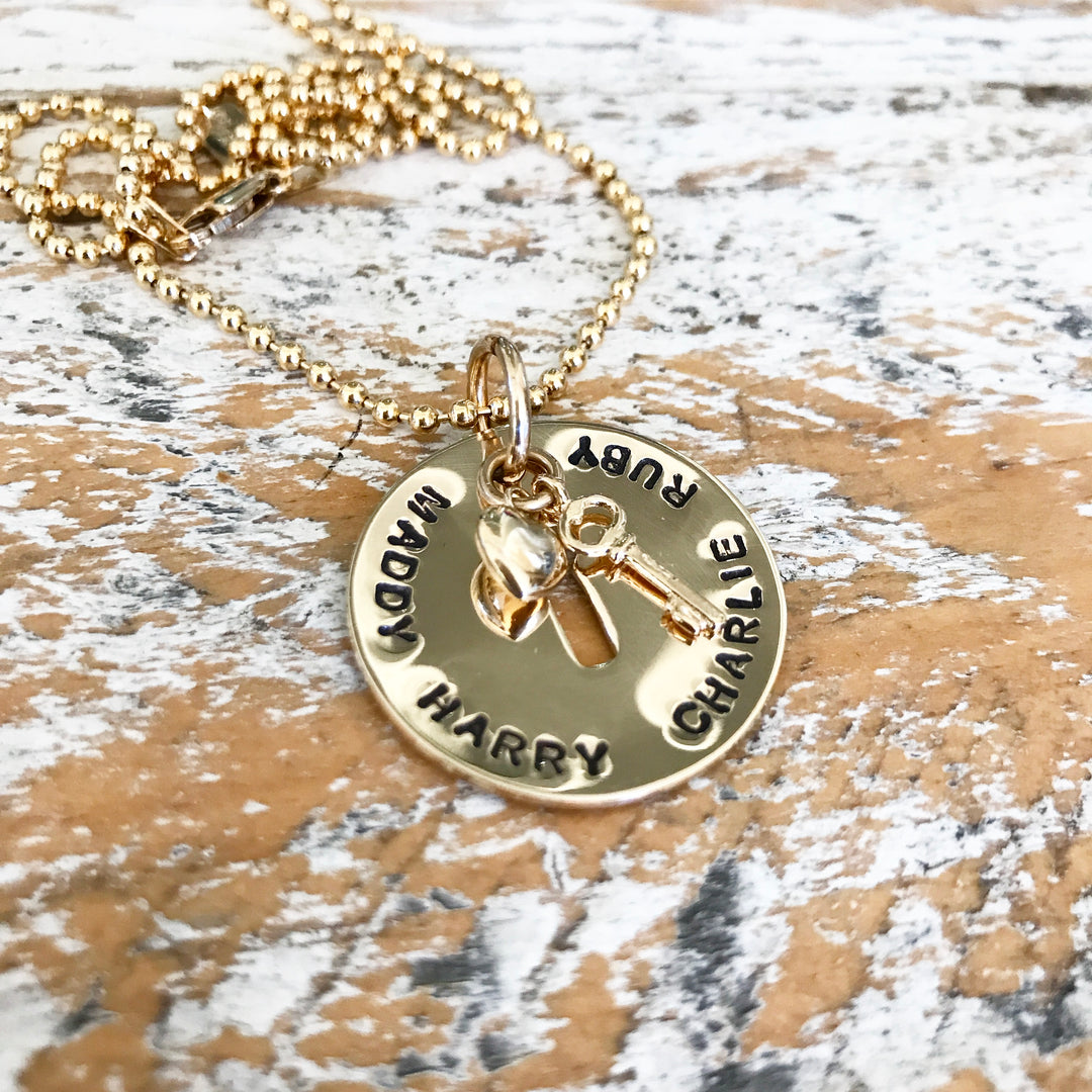 HAND STAMPED GOLD KEYHOLE PENDANT