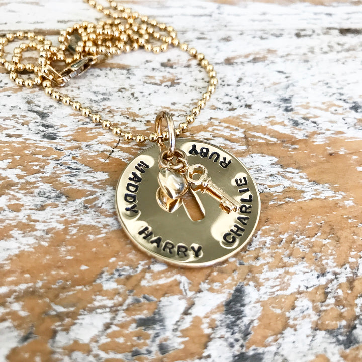 HAND STAMPED GOLD KEYHOLE PENDANT
