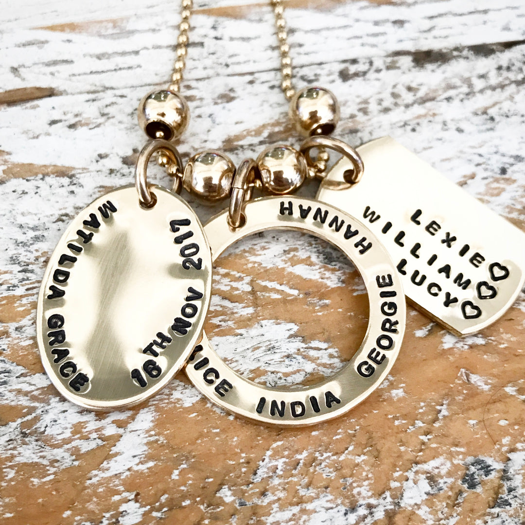 HAND STAMPED GOLD OVAL PENDANT