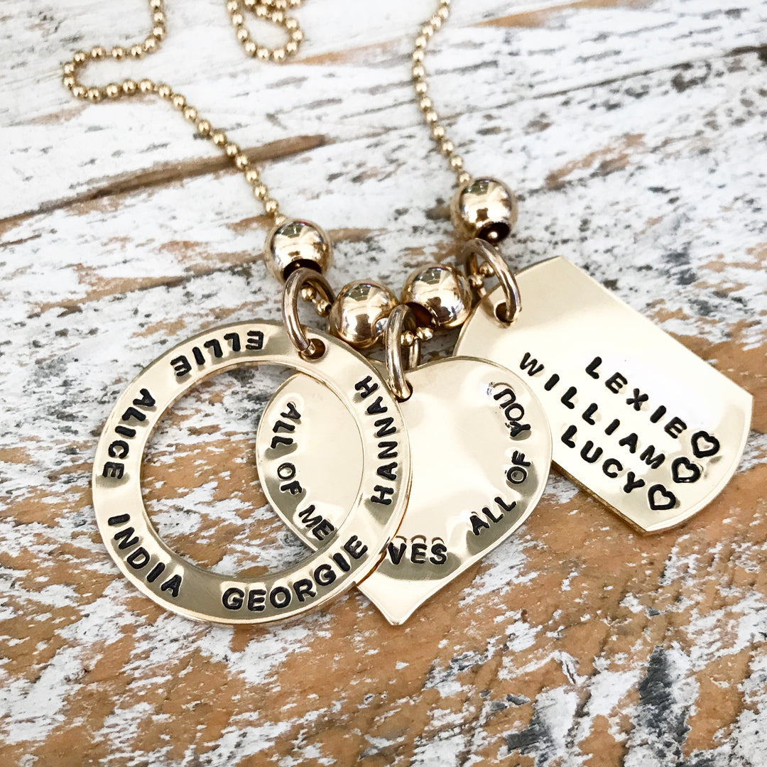HAND STAMPED GOLD LOVE PENDANT
