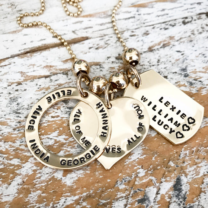 HAND STAMPED GOLD LOVE PENDANT